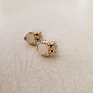 Kate Spade owl earrings in gold with pearlish body
